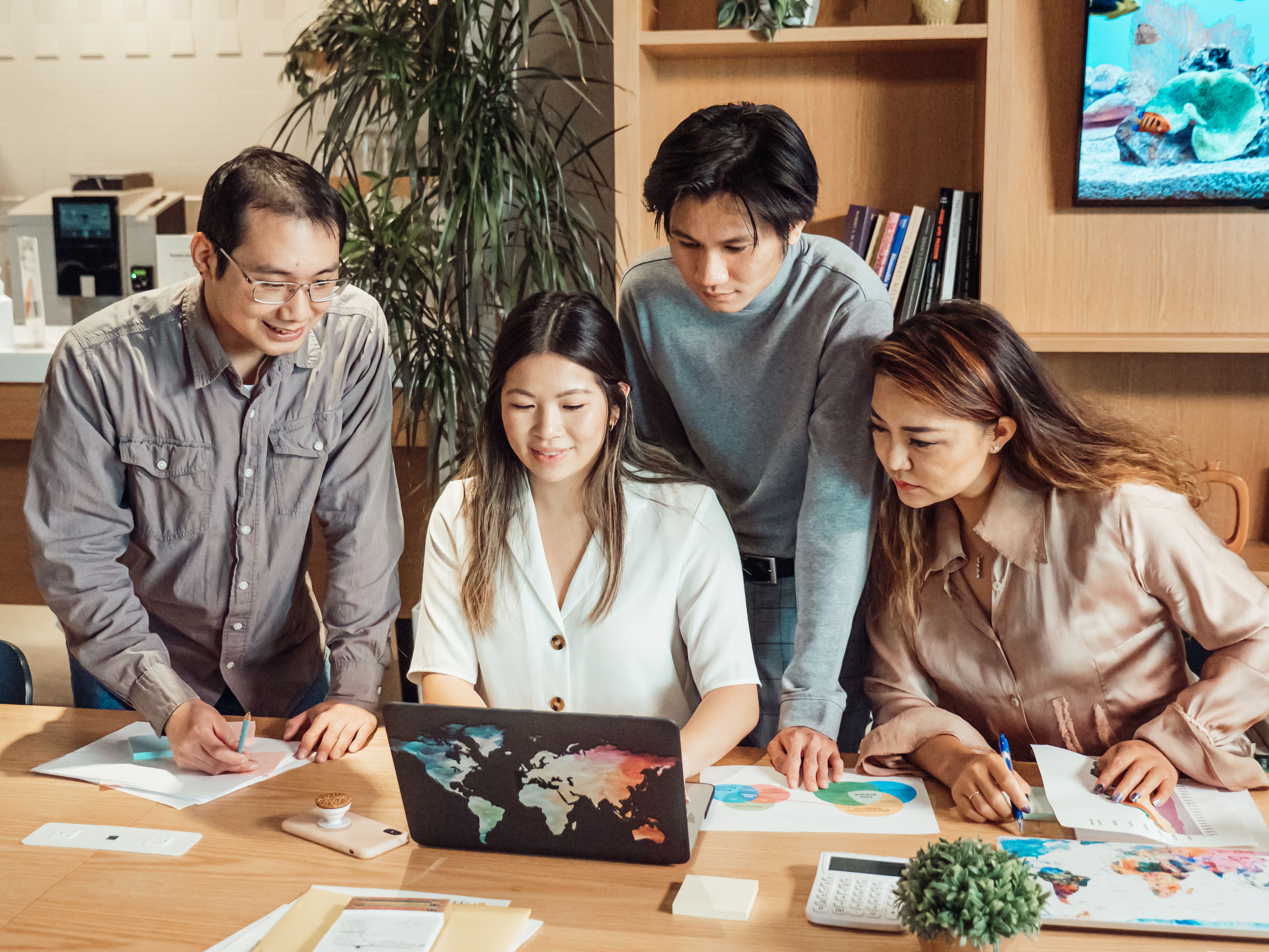 Professionals reviewing project plans in a meeting